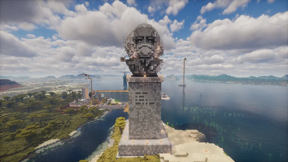 晴空下，海岸边矗立着巨大的石像与高塔
